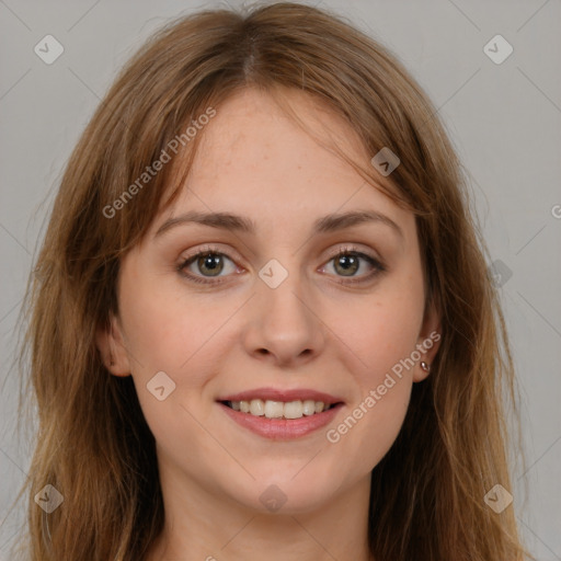 Joyful white young-adult female with long  brown hair and grey eyes