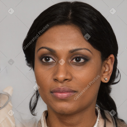 Joyful black young-adult female with medium  black hair and brown eyes