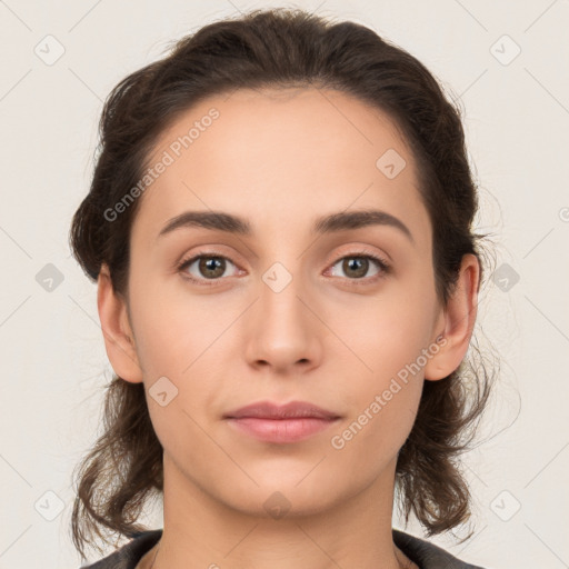 Neutral white young-adult female with medium  brown hair and brown eyes