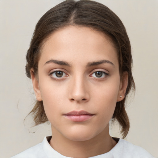 Neutral white young-adult female with medium  brown hair and brown eyes