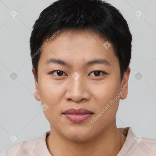 Joyful asian young-adult male with short  black hair and brown eyes