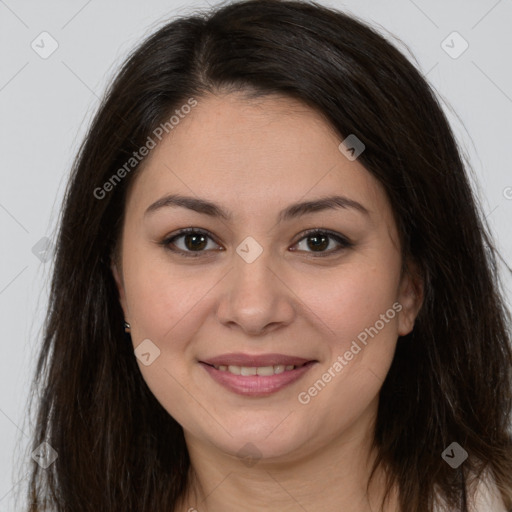 Joyful white young-adult female with long  brown hair and brown eyes