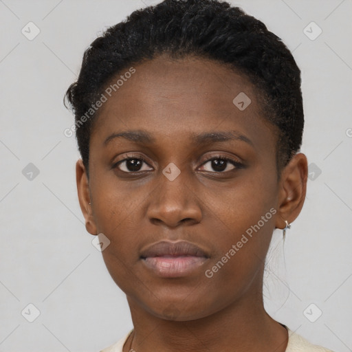 Neutral black young-adult female with short  brown hair and brown eyes