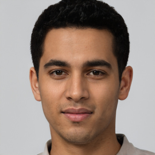 Neutral latino young-adult male with short  black hair and brown eyes