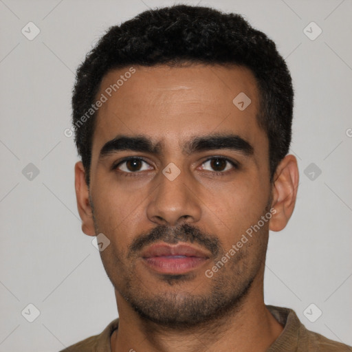 Neutral latino young-adult male with short  black hair and brown eyes