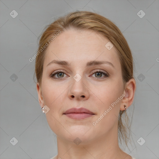 Joyful white young-adult female with medium  brown hair and blue eyes