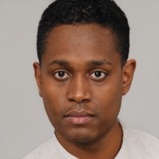 Neutral black young-adult male with short  black hair and brown eyes
