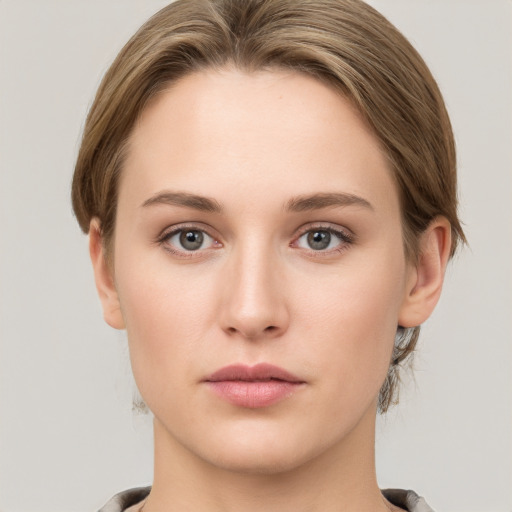 Neutral white young-adult female with medium  brown hair and grey eyes