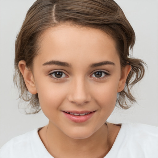 Joyful white child female with medium  brown hair and brown eyes