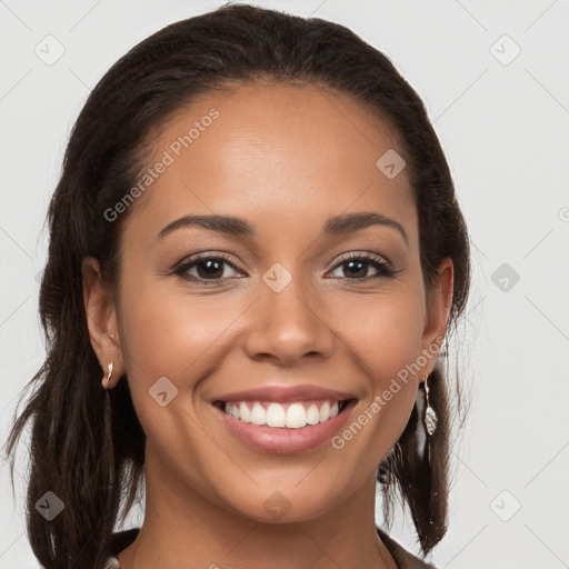 Joyful white young-adult female with long  brown hair and brown eyes