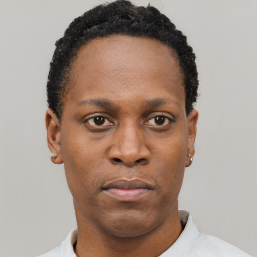 Neutral black young-adult male with short  black hair and brown eyes