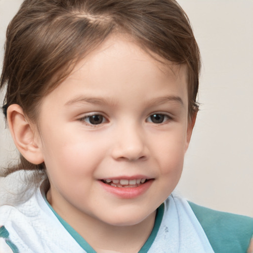 Joyful white child female with short  brown hair and brown eyes