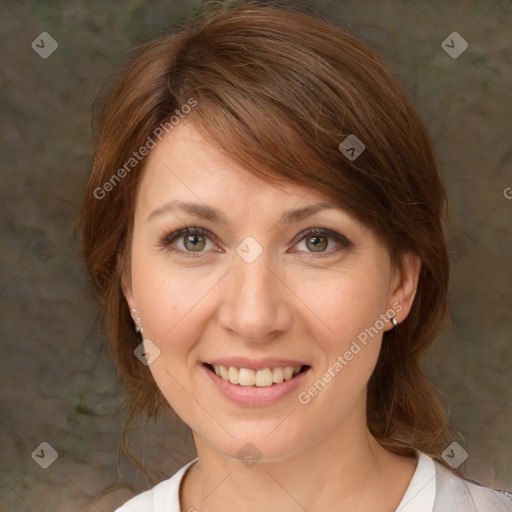 Joyful white adult female with medium  brown hair and brown eyes