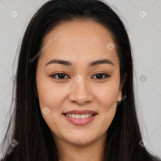 Joyful latino young-adult female with long  brown hair and brown eyes