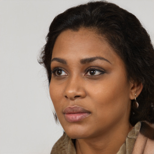 Neutral black young-adult female with long  black hair and brown eyes