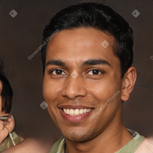 Joyful latino young-adult male with short  black hair and brown eyes