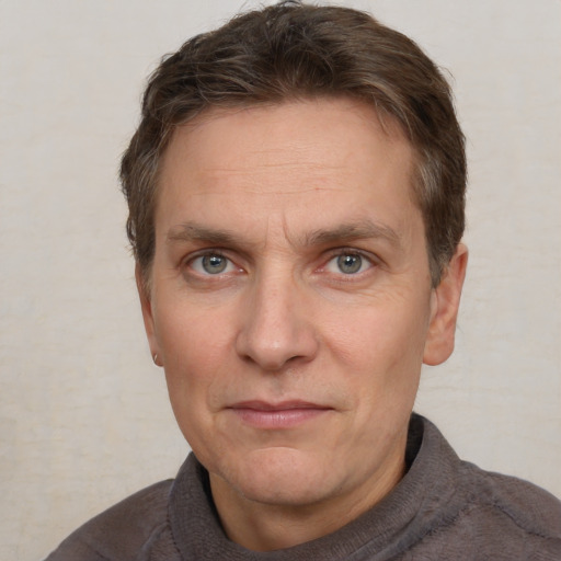 Neutral white adult male with short  brown hair and brown eyes