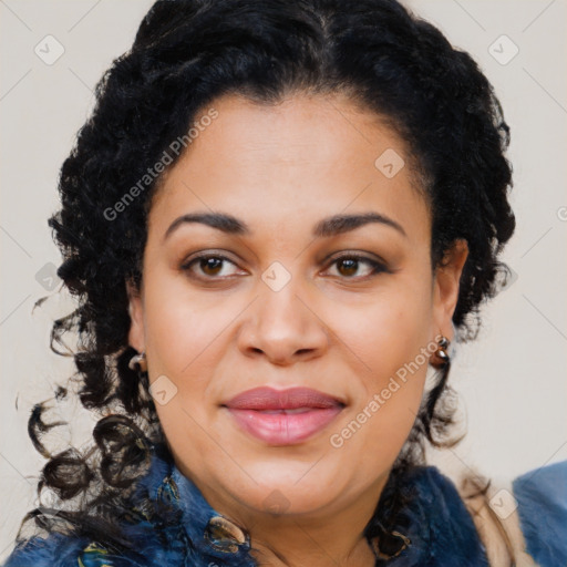 Joyful black young-adult female with long  brown hair and brown eyes