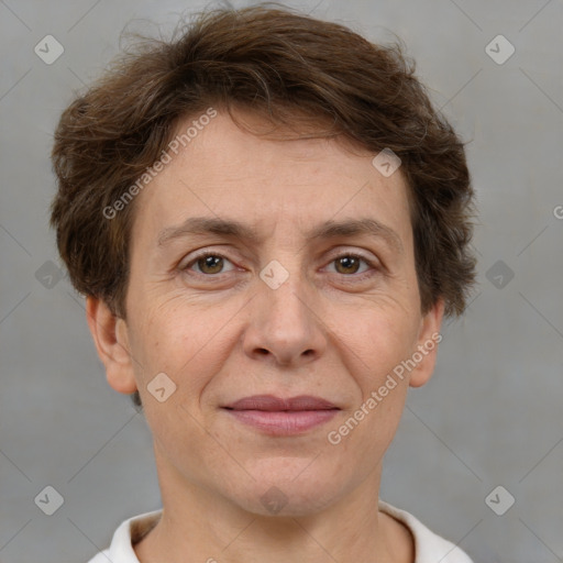 Joyful white adult female with short  brown hair and brown eyes