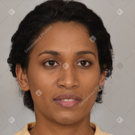 Joyful latino young-adult female with short  brown hair and brown eyes