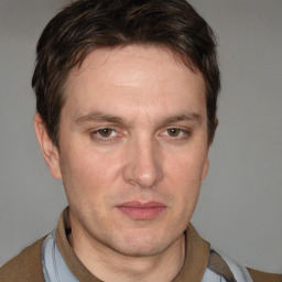 Neutral white adult male with short  brown hair and brown eyes