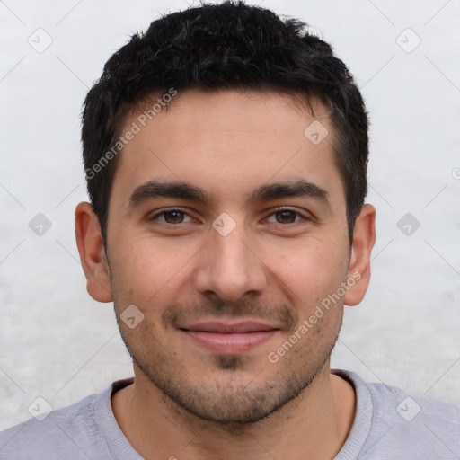 Joyful white young-adult male with short  black hair and brown eyes