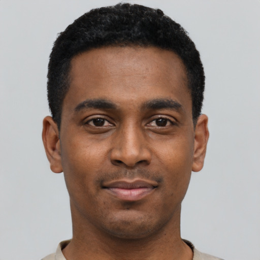 Neutral black young-adult male with short  black hair and brown eyes