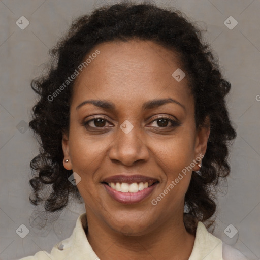 Joyful black young-adult female with medium  brown hair and brown eyes