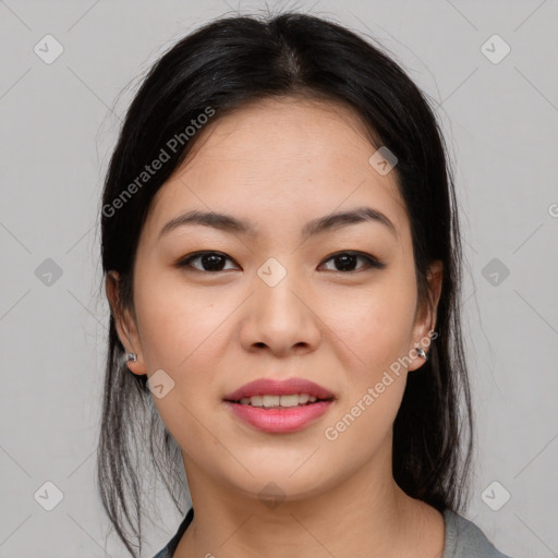 Joyful asian young-adult female with medium  black hair and brown eyes