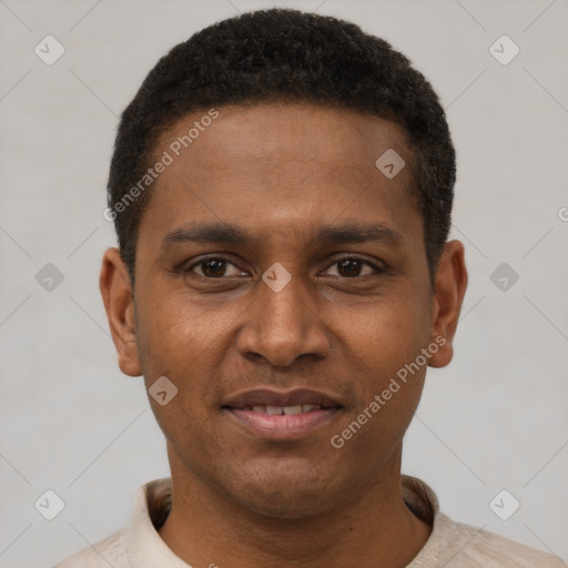 Joyful latino young-adult male with short  black hair and brown eyes