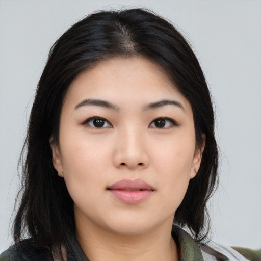 Neutral asian young-adult female with medium  black hair and brown eyes