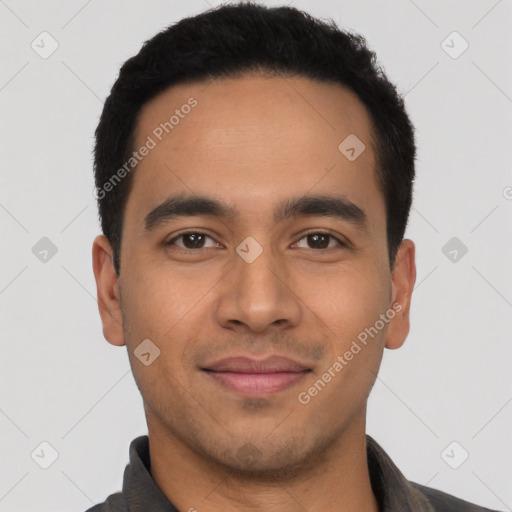 Joyful latino young-adult male with short  black hair and brown eyes