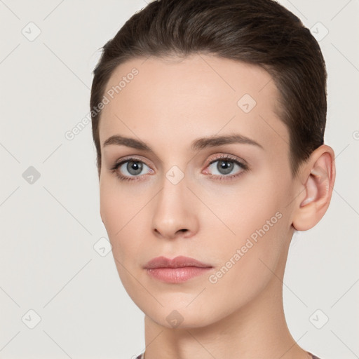 Neutral white young-adult female with short  brown hair and brown eyes