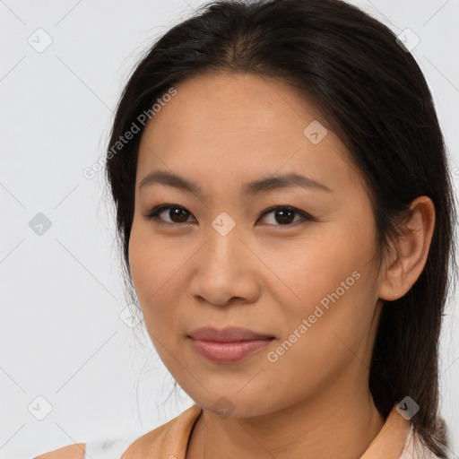 Joyful latino young-adult female with medium  brown hair and brown eyes