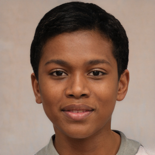 Joyful black child female with short  black hair and brown eyes