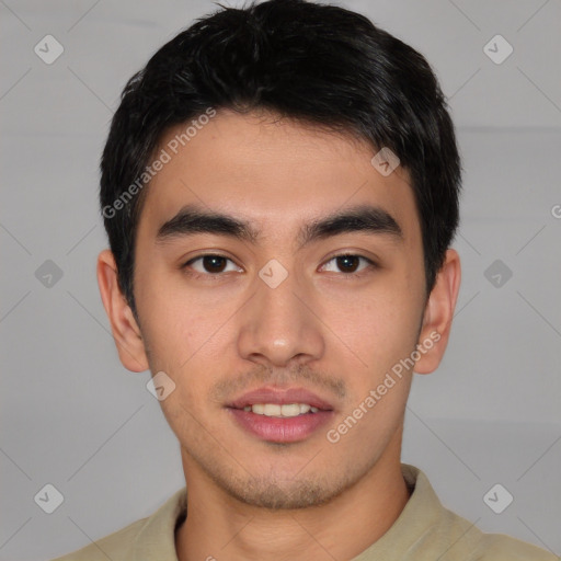 Joyful asian young-adult male with short  brown hair and brown eyes