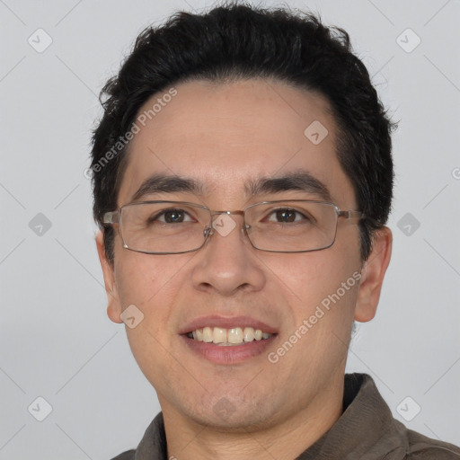 Joyful white young-adult male with short  black hair and brown eyes