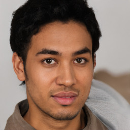 Neutral latino young-adult male with short  brown hair and brown eyes