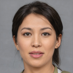 Joyful asian young-adult female with medium  brown hair and brown eyes