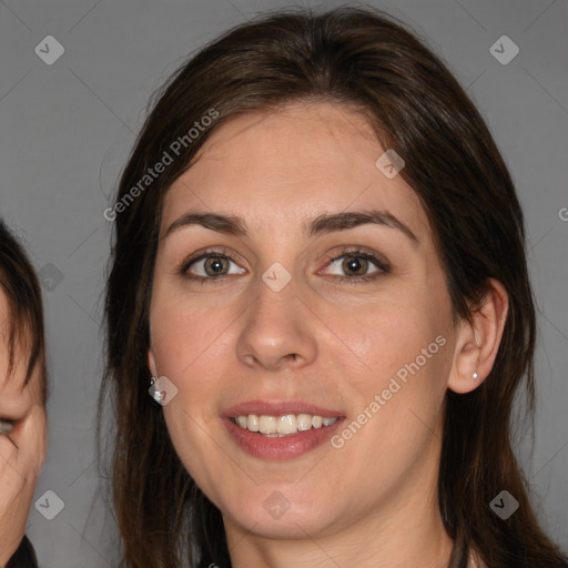 Joyful white young-adult female with medium  brown hair and brown eyes