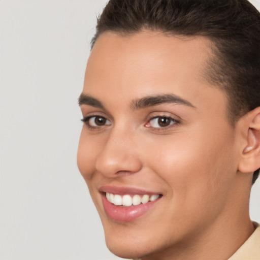 Joyful white young-adult female with short  brown hair and brown eyes