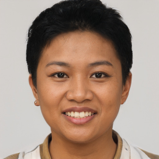 Joyful asian young-adult female with short  black hair and brown eyes