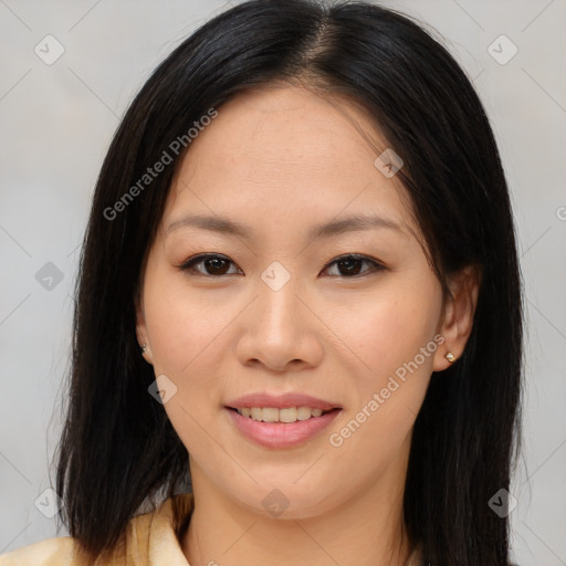 Joyful asian young-adult female with medium  brown hair and brown eyes