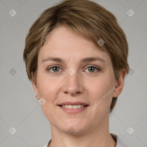 Joyful white young-adult female with short  brown hair and grey eyes