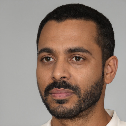 Neutral black young-adult male with short  black hair and brown eyes