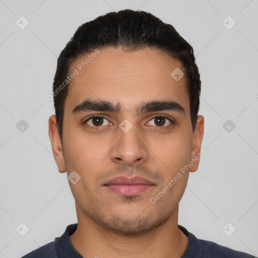 Neutral latino young-adult male with short  black hair and brown eyes