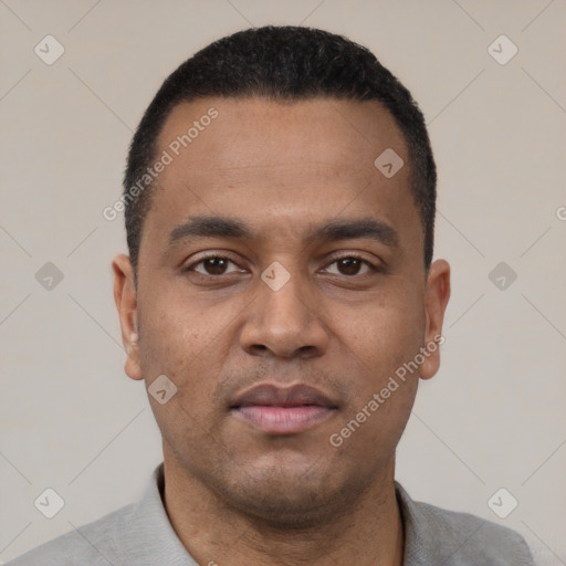 Neutral latino young-adult male with short  black hair and brown eyes