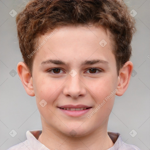 Joyful white child male with short  brown hair and brown eyes