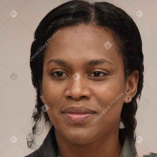 Joyful black young-adult female with medium  brown hair and brown eyes