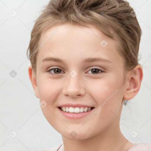 Joyful white child female with short  brown hair and brown eyes